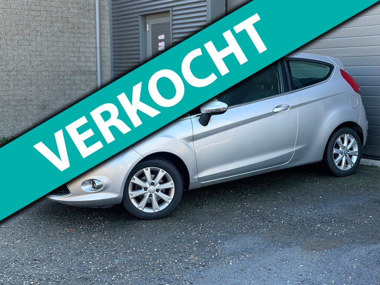Ford Fiesta - 1.25 Ghia 1.25 Ghia - AutoWereld.nl