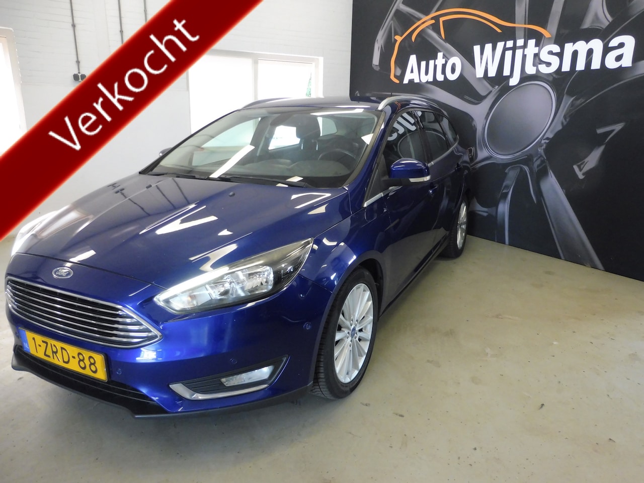 Ford Focus Wagon - 1.0 Titanium Trekhaak | Cruise | LMV | PDC | Verw voorr. | Navi - AutoWereld.nl