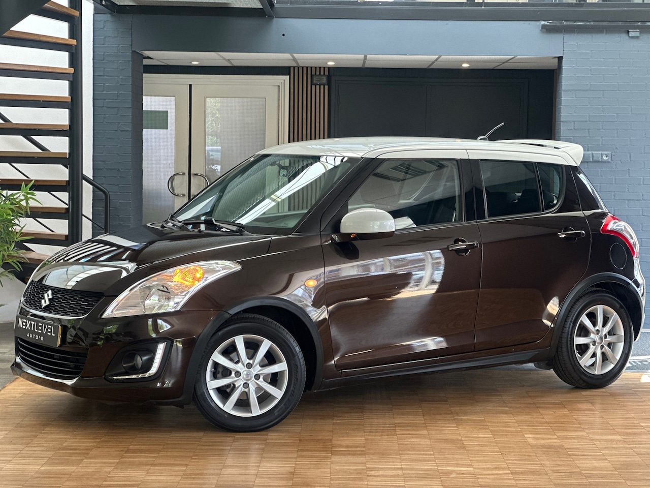 Suzuki Swift - 1.2 Dynamic EASSS Stoelverwarming Airco Cruise NAP Dealer Onderhouden - AutoWereld.nl