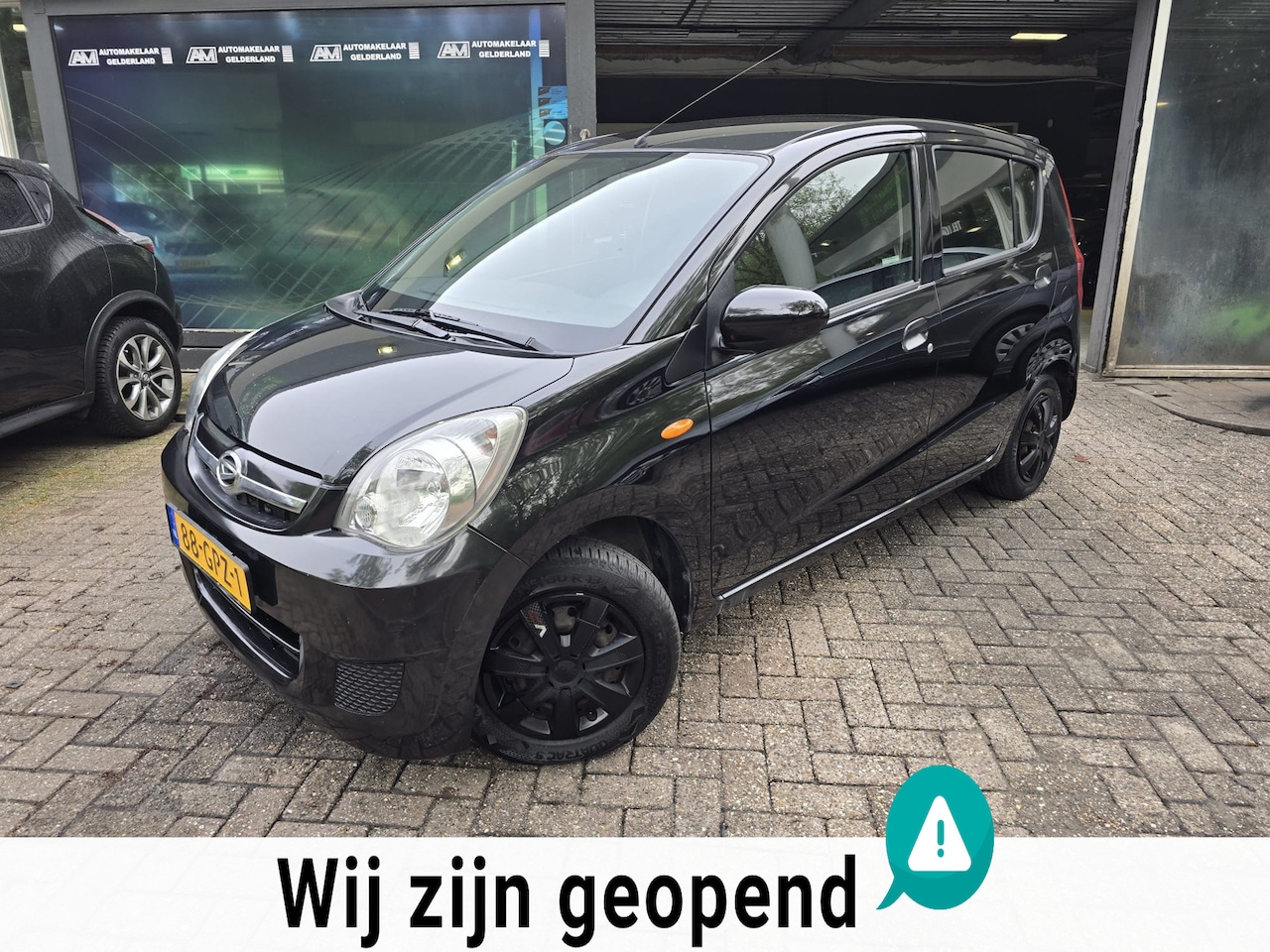 Daihatsu Cuore - 1.0 Premium | 1E EIGENAAR |3/6 OF 12MND GARANTIE | AIRCO | ELEC RAMEN | NW APK | - AutoWereld.nl