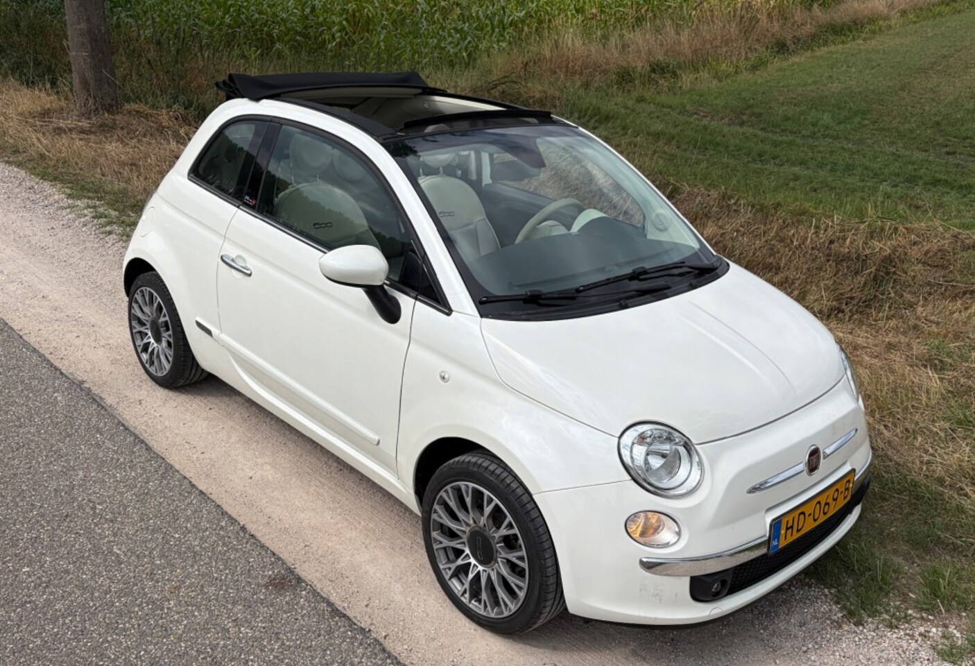 Fiat 500 C - 1.2 cabriolet met slechts 42.700 km ! Airco NL auto - AutoWereld.nl