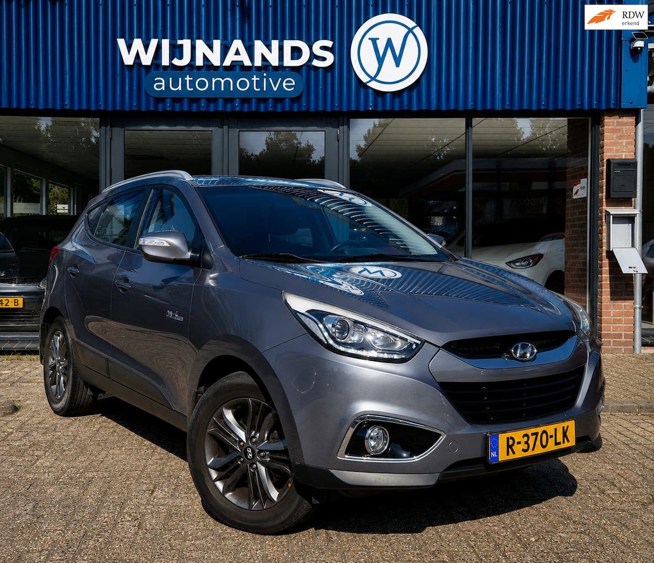Hyundai ix35 - 1.6i GDI i-Vision Trekhaak Stoelverwarming Clima - AutoWereld.nl