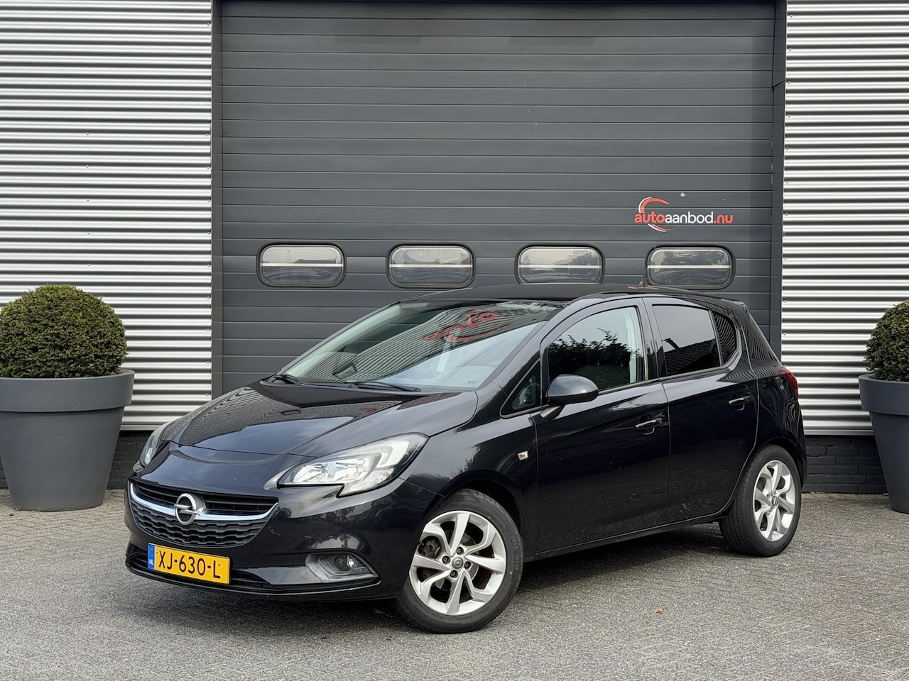 Opel Corsa - 1.4 Cosmo | Climate Control | Parkeersensoren | Lichtmetalen Velgen | Privacy Glass | - AutoWereld.nl