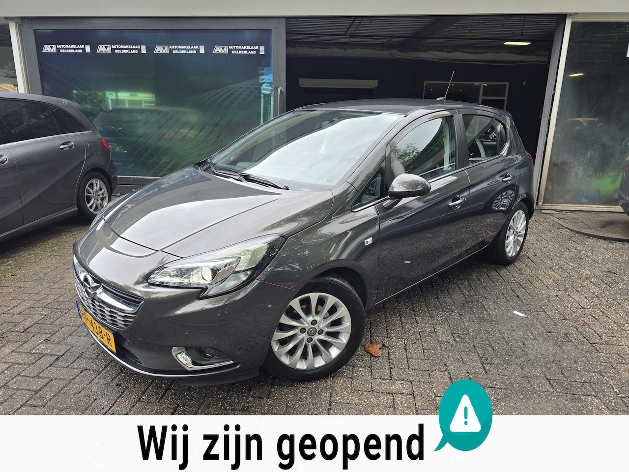 Opel Corsa - 1.4 Cosmo | AUTOMAAT | 1E EIGENAAR |3/6 OF 12MND GARANTIE | CAMERA | LAGE KM STAND | | - AutoWereld.nl