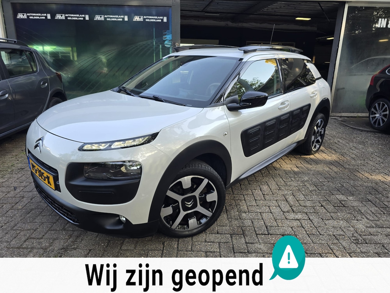 Citroën C4 Cactus - 1.2 110 PK Shine | 2E EIGENAAR |3/6 OF 12MND GARANTIE | CAMERA | AIRCO | CRUISE | NAVI | - AutoWereld.nl