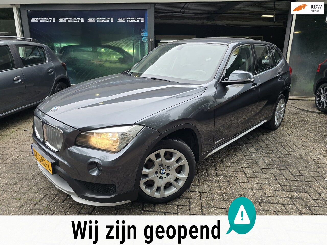 BMW X1 - SDrive18d Executive |3/6 OF 12MND GARANTIE | NW APK | AIRCO | NAVI | CAMERA | CRUISE | - AutoWereld.nl