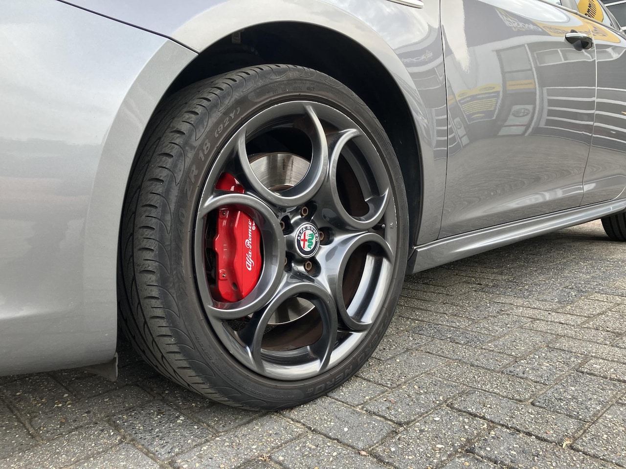 Alfa Romeo Giulietta - 1.4 Turbo MultiAir Super | Rood lederen bekleding | Grigio Magnesio | Trekhaak |