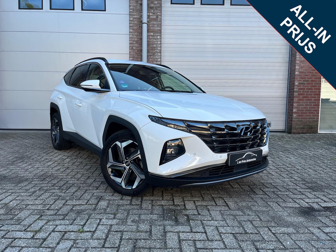 Hyundai Tucson - 1.6 T-GDI HEV Comfort N.a.p/Adapt CC/Carplay/Camera/Garantie - AutoWereld.nl