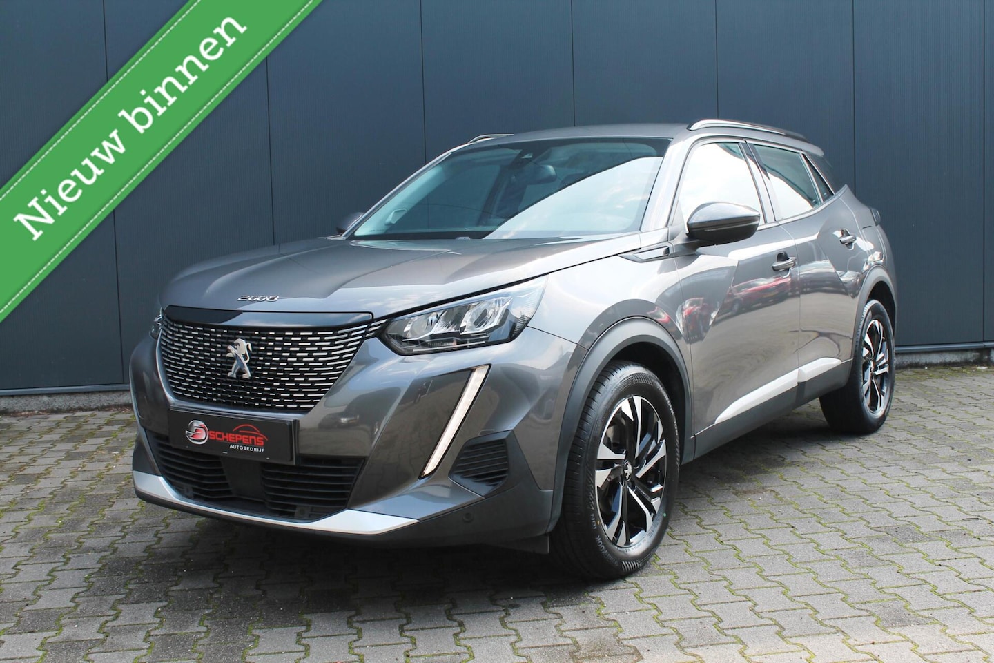 Peugeot 2008 - 1.2 PureTech Allure | 3D cockpit | Camera | Carplay | Clima - AutoWereld.nl