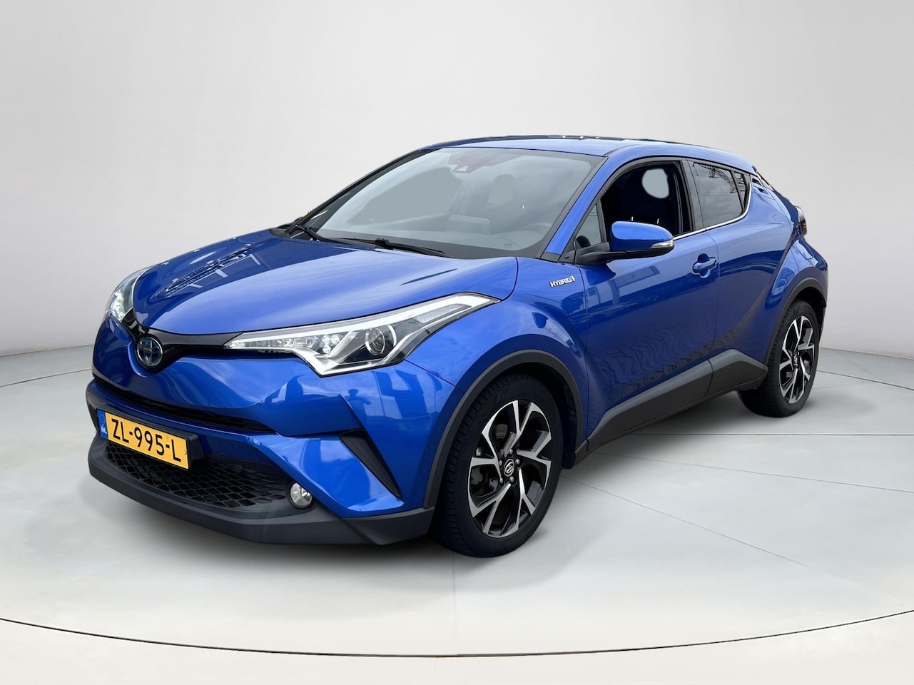 Toyota C-HR - 1.8 Hybrid Dynamic | Navigatie | Parkeercamera | Stoel verwarming | Rijklaarprijs! | - AutoWereld.nl