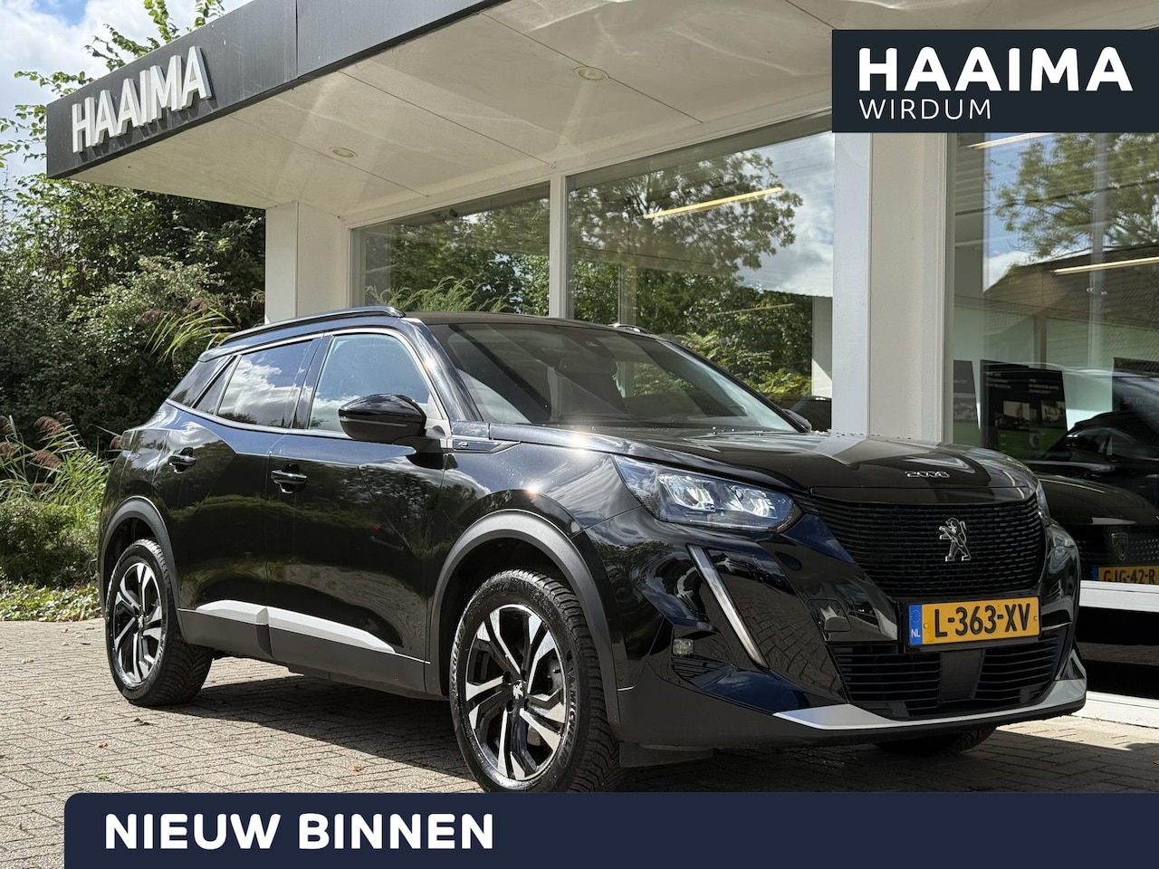 Peugeot e-2008 - EV Blue Lease Allure 50 kWh | Achteruitrijcamera | Navigatie | Trekhaak voor fietsendrager - AutoWereld.nl