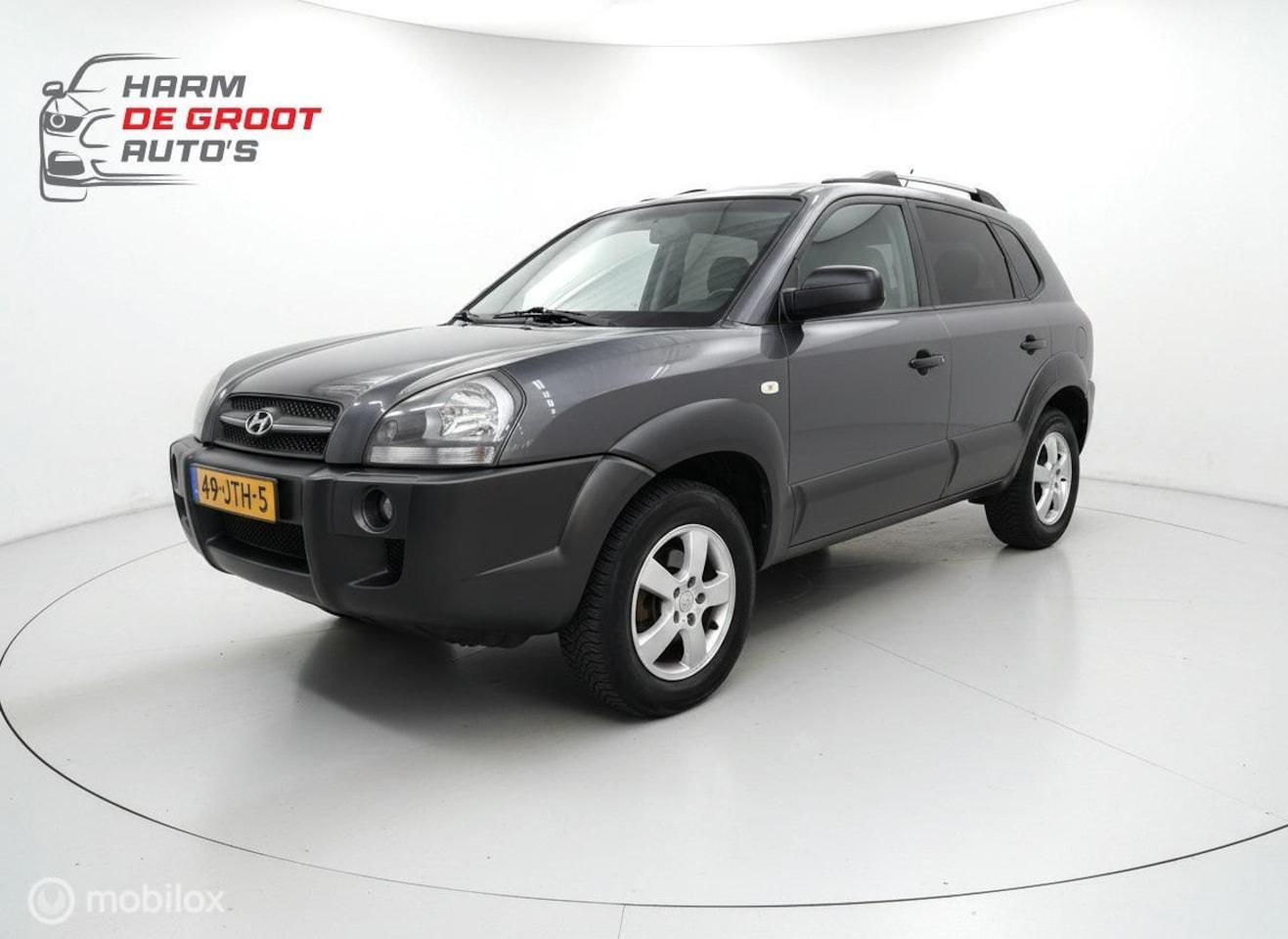 Hyundai Tucson - 2.0i Automaat/Airco/1e eigenaar/Rijklaar! - AutoWereld.nl