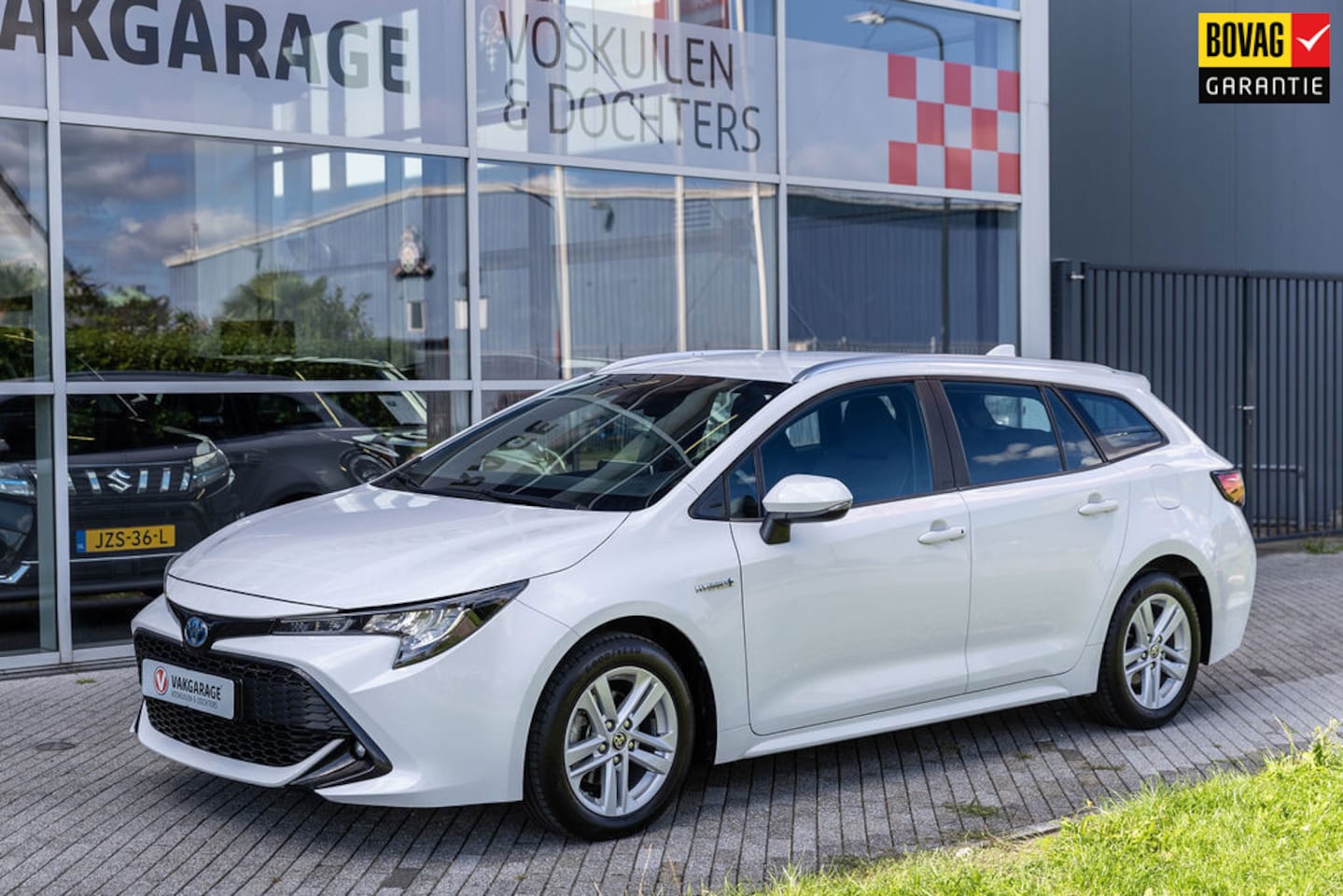 Toyota Corolla Touring Sports - 1.8 Hybrid Business |Apple Carplay| Navi | Stoelverw - AutoWereld.nl