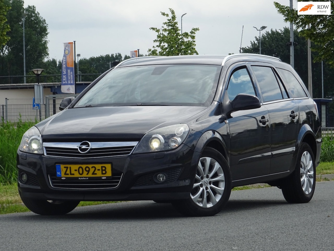 Opel Astra Wagon - 1.8 Cosmo AUTOMAAT LEER/XENON/AC/CRUISE/PDC - AutoWereld.nl