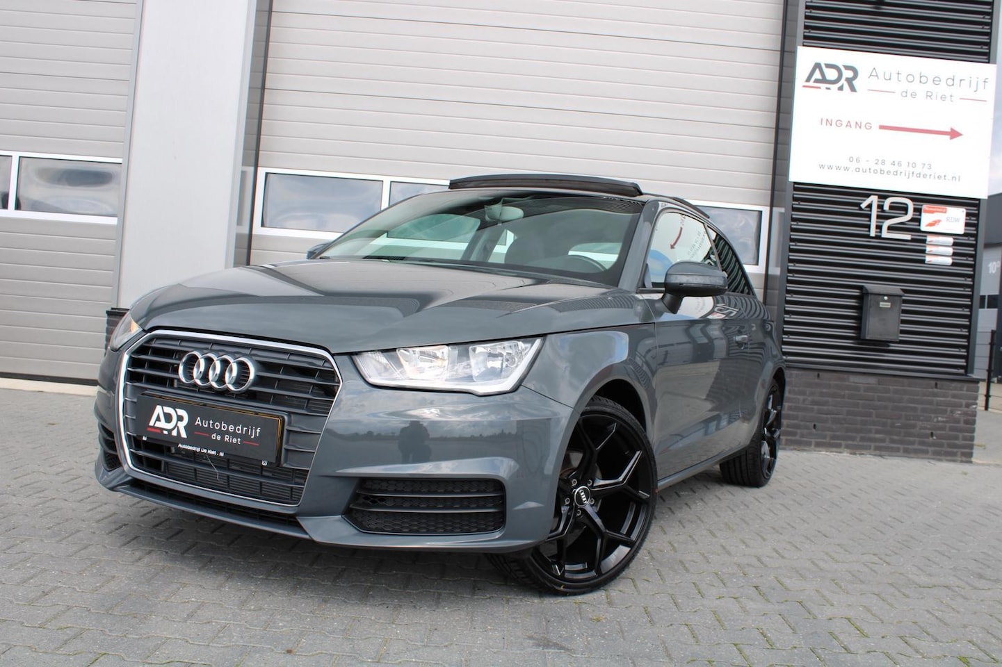 Audi A1 Sportback - 1.0 TFSI|18''LM|AIRCO|PDC|NAVI|NARDOGREY|PANO|UNIEK - AutoWereld.nl