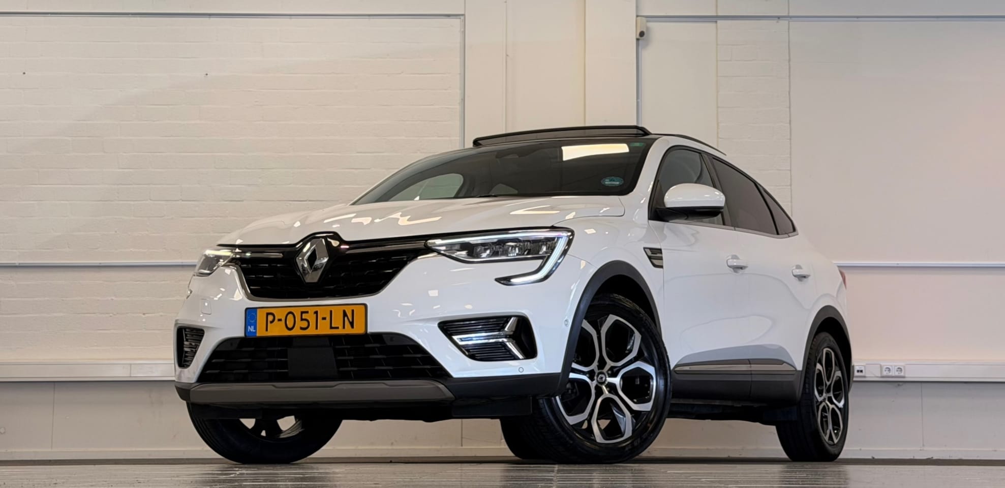 Renault Arkana - 1.6 E-Tech Hybrid 145 Intens Trekhaak Schuif/kanteldak - AutoWereld.nl