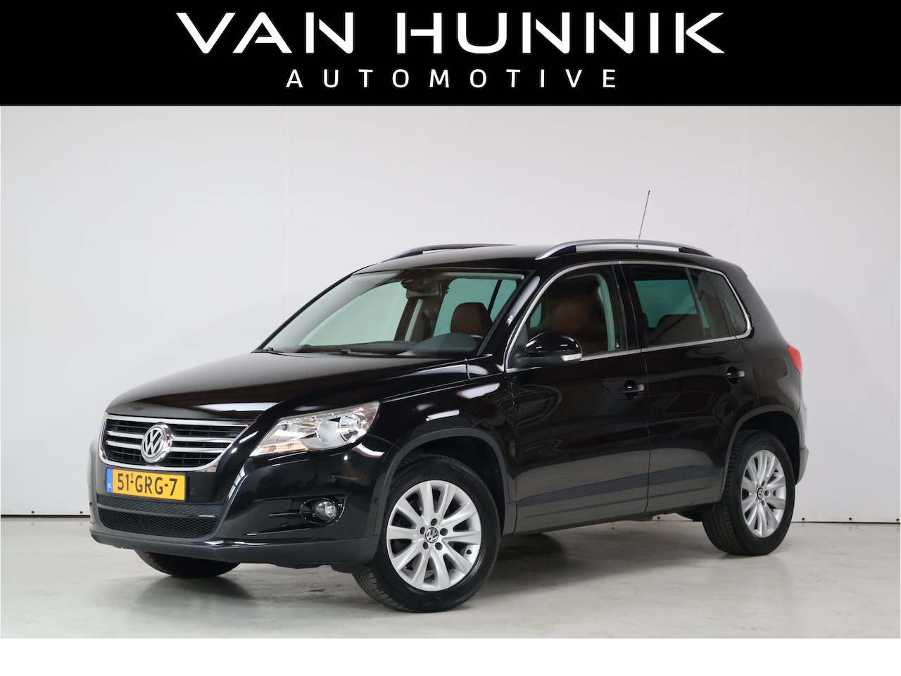 Volkswagen Tiguan - 1.4 TSI Sport&Style 4M | Cruise | Trekhaak | Leder | Stoelverwarming - AutoWereld.nl