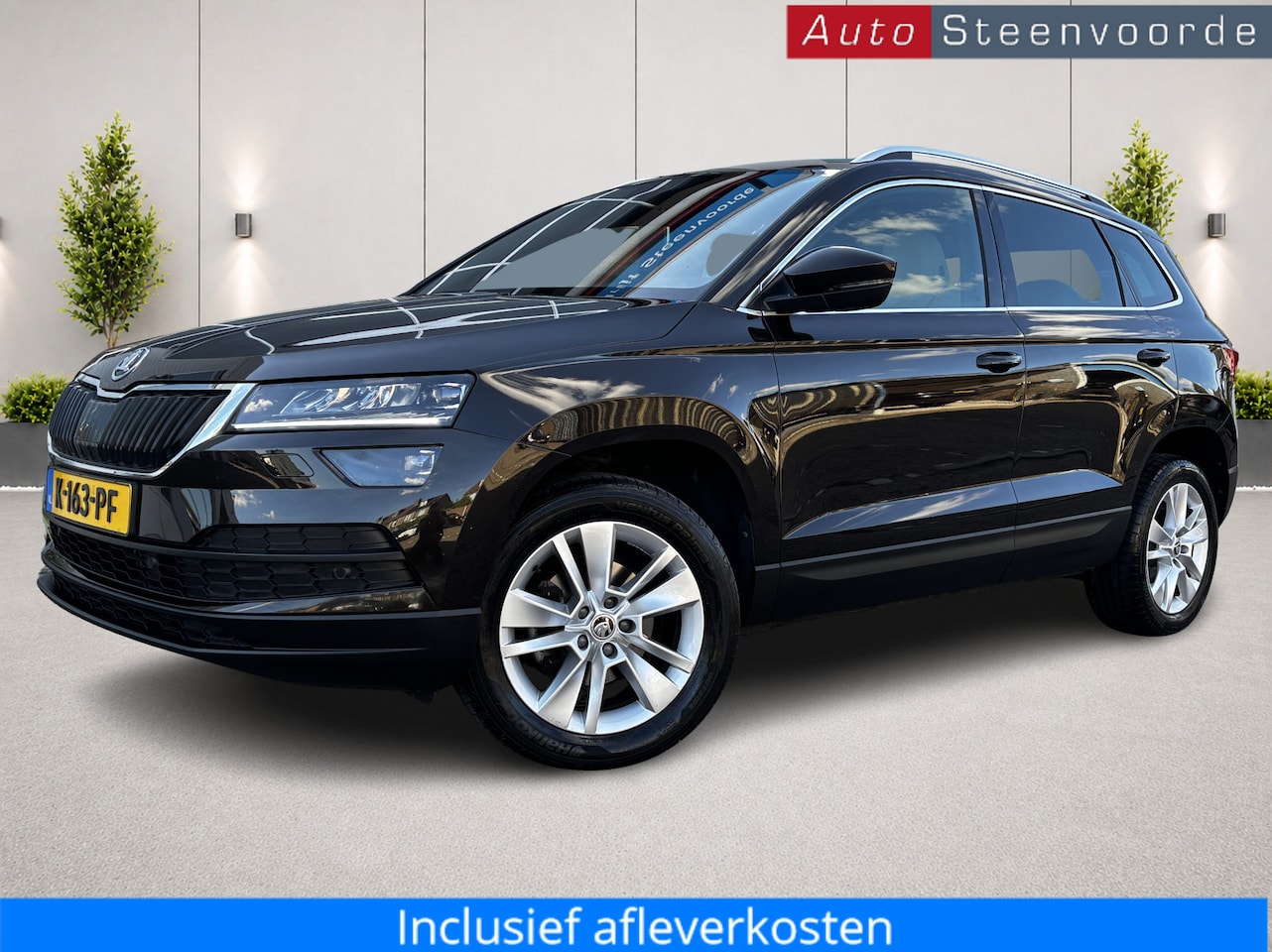 Skoda Karoq - 1.5 TSI ACT Business Edition Plus * CREME LEER * CAMERA - AutoWereld.nl