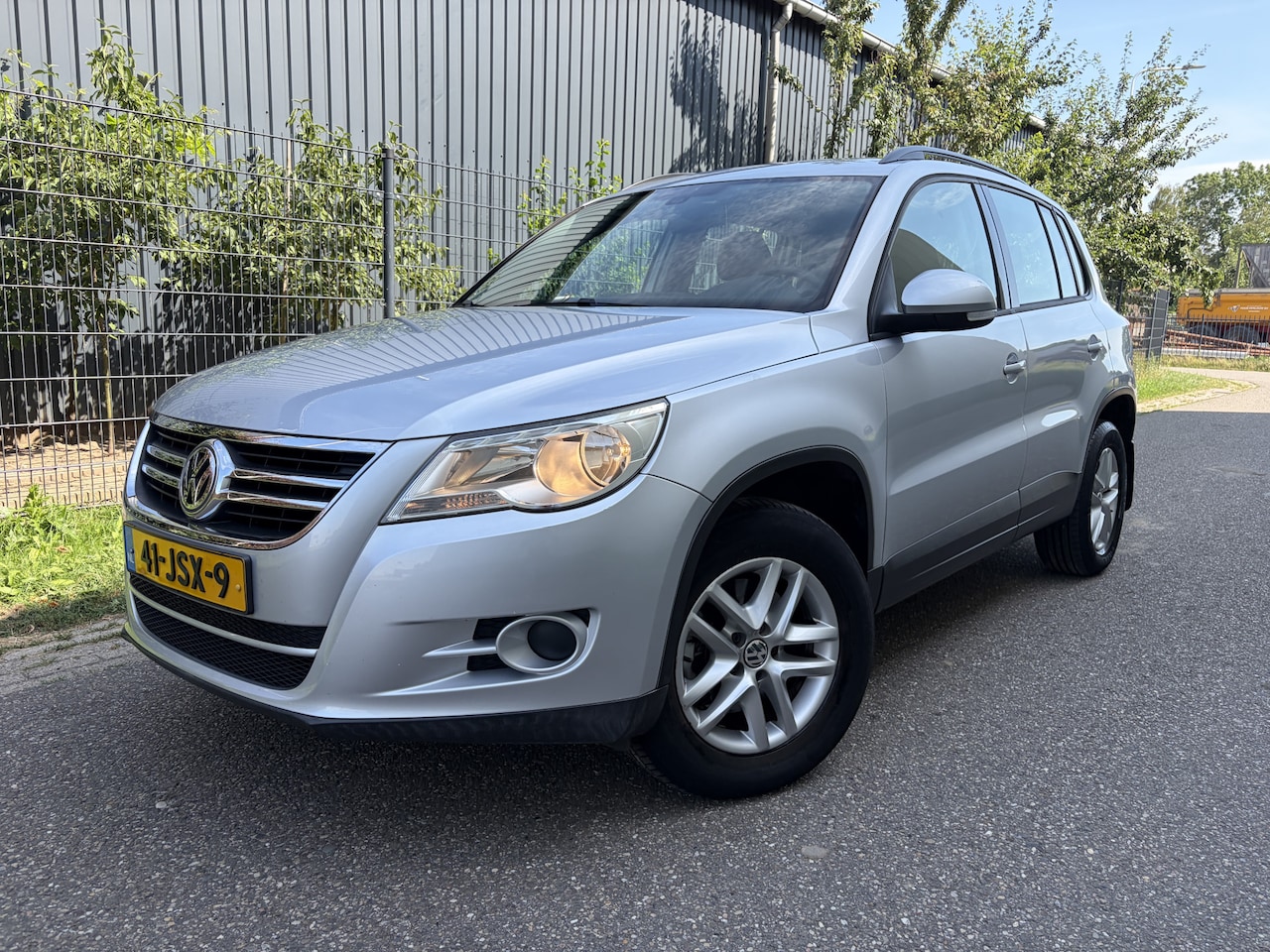 Volkswagen Tiguan - 1.4 TSI Comfort&Design / AIRCO / CRUISE / NAVI / 153dkm! NAP! - AutoWereld.nl