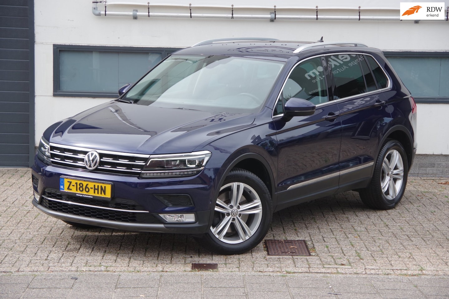 Volkswagen Tiguan - 2.0 TSI 4Motion Highline |Elek achterklep|standkachel| Nieuwstaat| - AutoWereld.nl