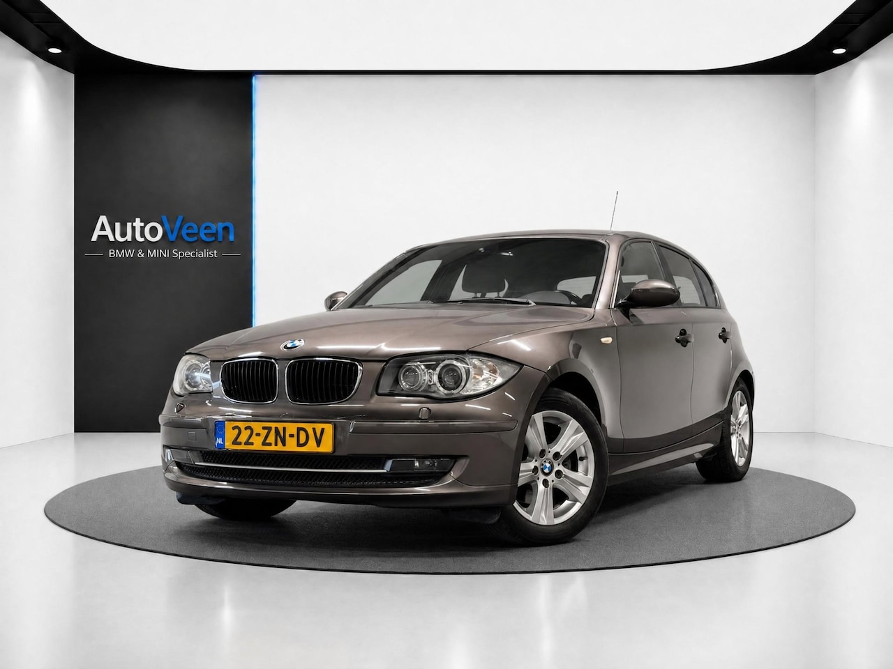 BMW 1-serie - 120i High Executive (LEDER, CRUISE, TREKHAAK, STOELVERWARMING) - AutoWereld.nl
