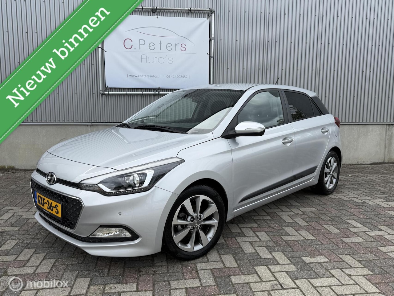 Hyundai i20 - 1.2 HP i-Motion Comfort 2015 / Climatecontrol / Cruisecontrol / Stoel+stuurverwarming / Pa - AutoWereld.nl