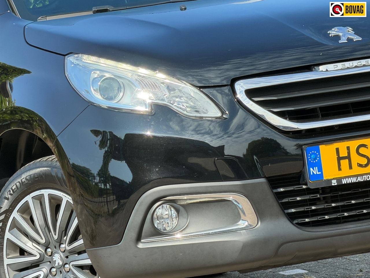 Peugeot 2008 - 1.2 PureTech Active Pack - Noir Perla Nera - Nav/Panorama - Keurig - AutoWereld.nl