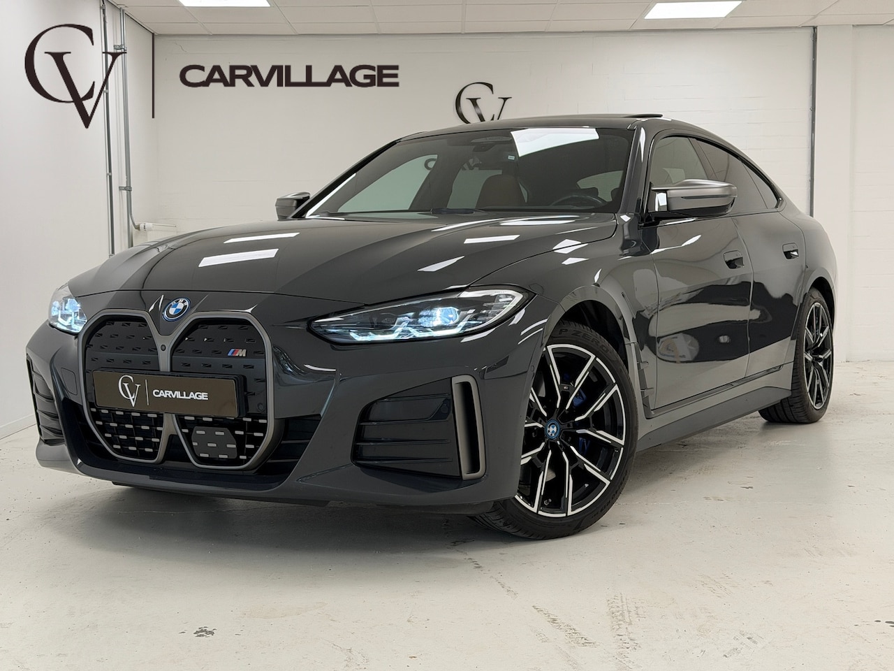 BMW i4 - M50 M-Sport Pro 84 kWh | Dravit Grau | Cognac Interieur | Sportstoelen | - AutoWereld.nl