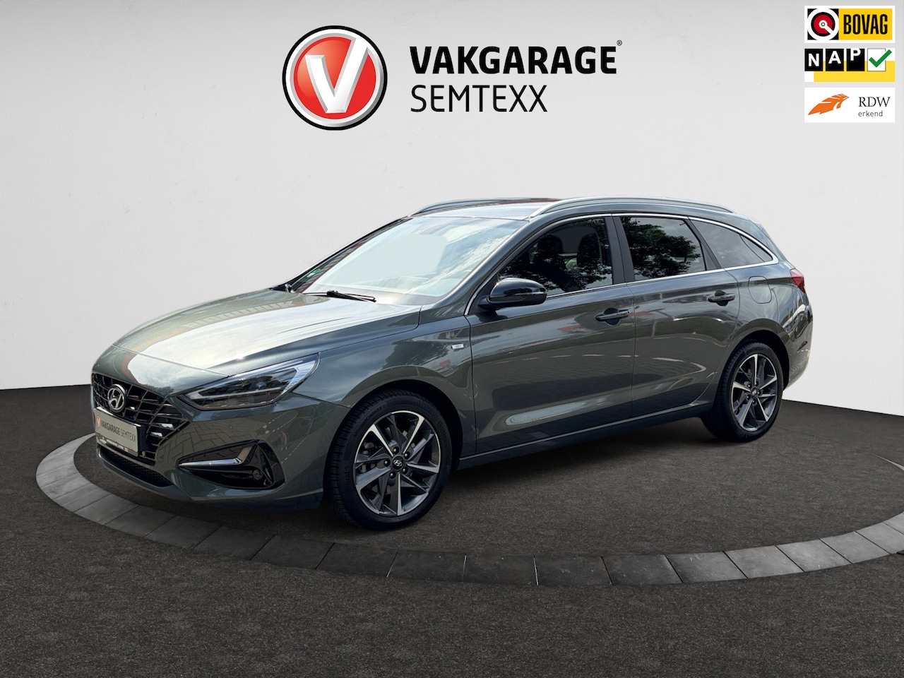 Hyundai i30 Wagon - 1.5 T-GDi MHEV Premium | Clima | Camera | Cruise | Navi | PDC Voor & Achter | Stoelverw. | - AutoWereld.nl