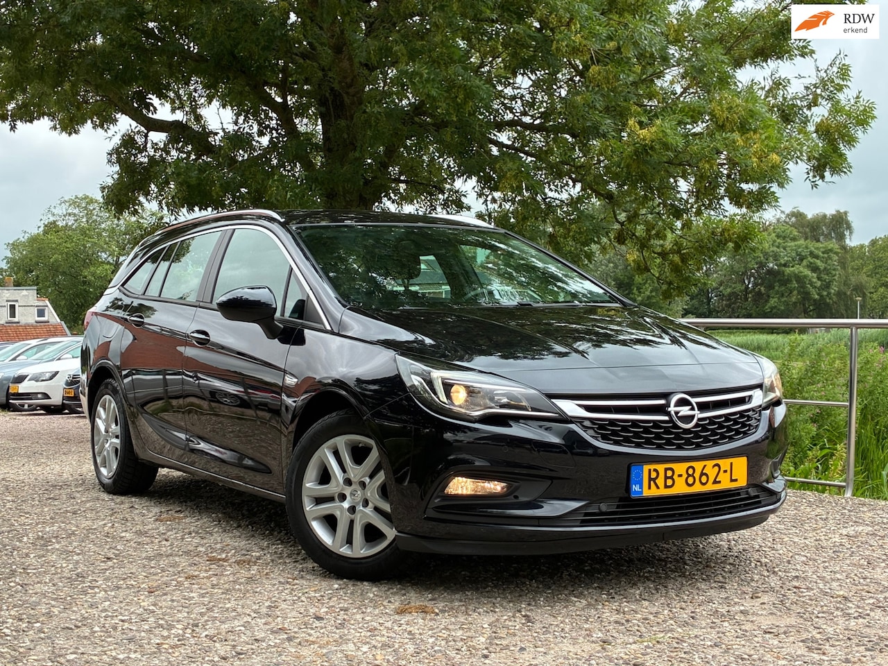 Opel Astra Sports Tourer - 1.4 Business+ | Carplay + Cruise + Clima + Navi nu €4.975,-!!! - AutoWereld.nl
