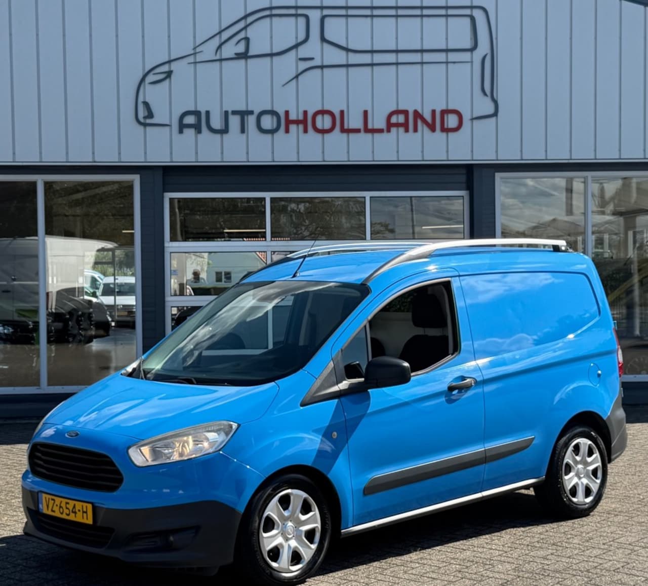 Ford Transit Courier - 1.5 TDCI 55KW 75PK EURO 6 AIRCO/ CRUISE CONTROL/ NAVIGATIE/ 100 - AutoWereld.nl