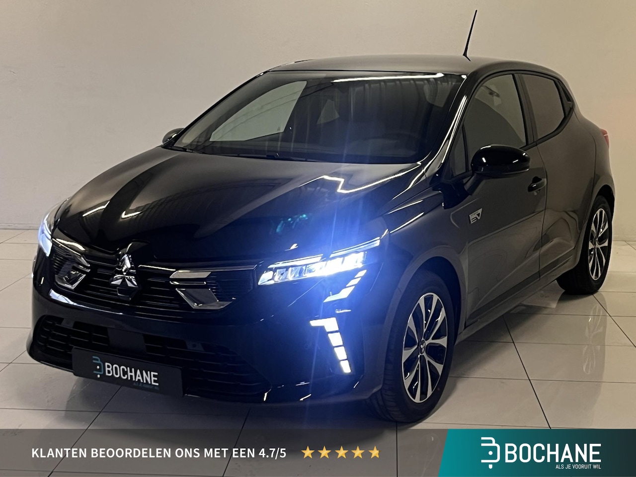 Mitsubishi Colt - 1.6 HEV 145 Intense | Apple Carplay/Android Auto | Parkeersensoren voor, achter en achteru - AutoWereld.nl
