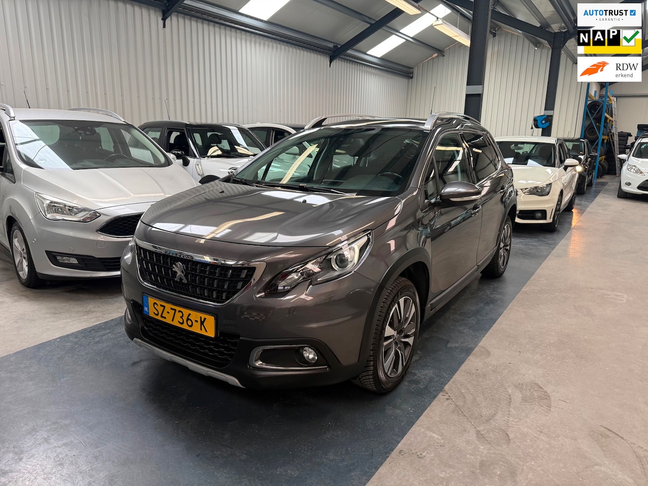 Peugeot 2008 - 1.2 PureTech Allure AUTOMAAT/CLIMA/NAP/APK - AutoWereld.nl