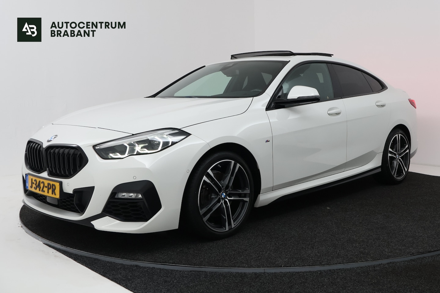 BMW 2-serie Gran Coupé - 218i High Executive (PANORAMADAK, STOELVERWARMING, NAVIGATIE, DEALER ONDERHOUDEN) - AutoWereld.nl