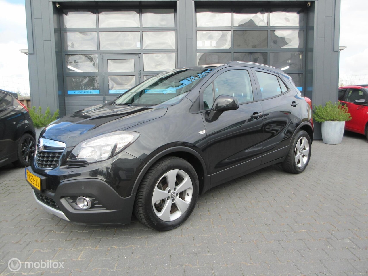 Opel Mokka - 1.4 T Cosmo 90dkm! Airco Cruise Trekhaak Hoge zit! - AutoWereld.nl