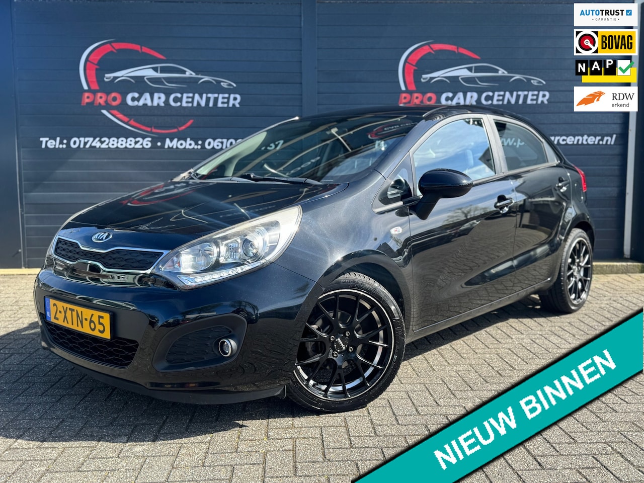 Kia Rio - 1.2 CVVT BusinessLine AIRCO|CRUISE|PDC|NW.KOPPELING|EL.RAMEN|LMV|NAP|APK - AutoWereld.nl