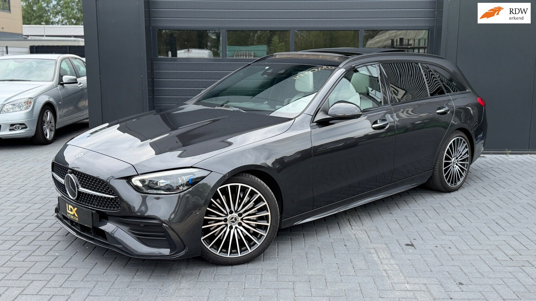 Mercedes-Benz C-klasse Estate - 200 d AMG Line Pano|360°|Keyless|Burmeister - AutoWereld.nl