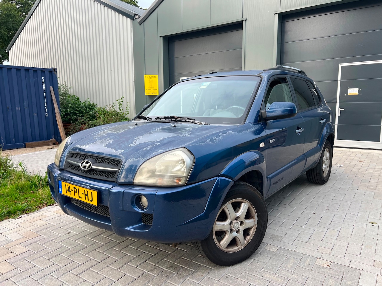Hyundai Tucson - 2.0i 4WD Style 4x4 - AutoWereld.nl