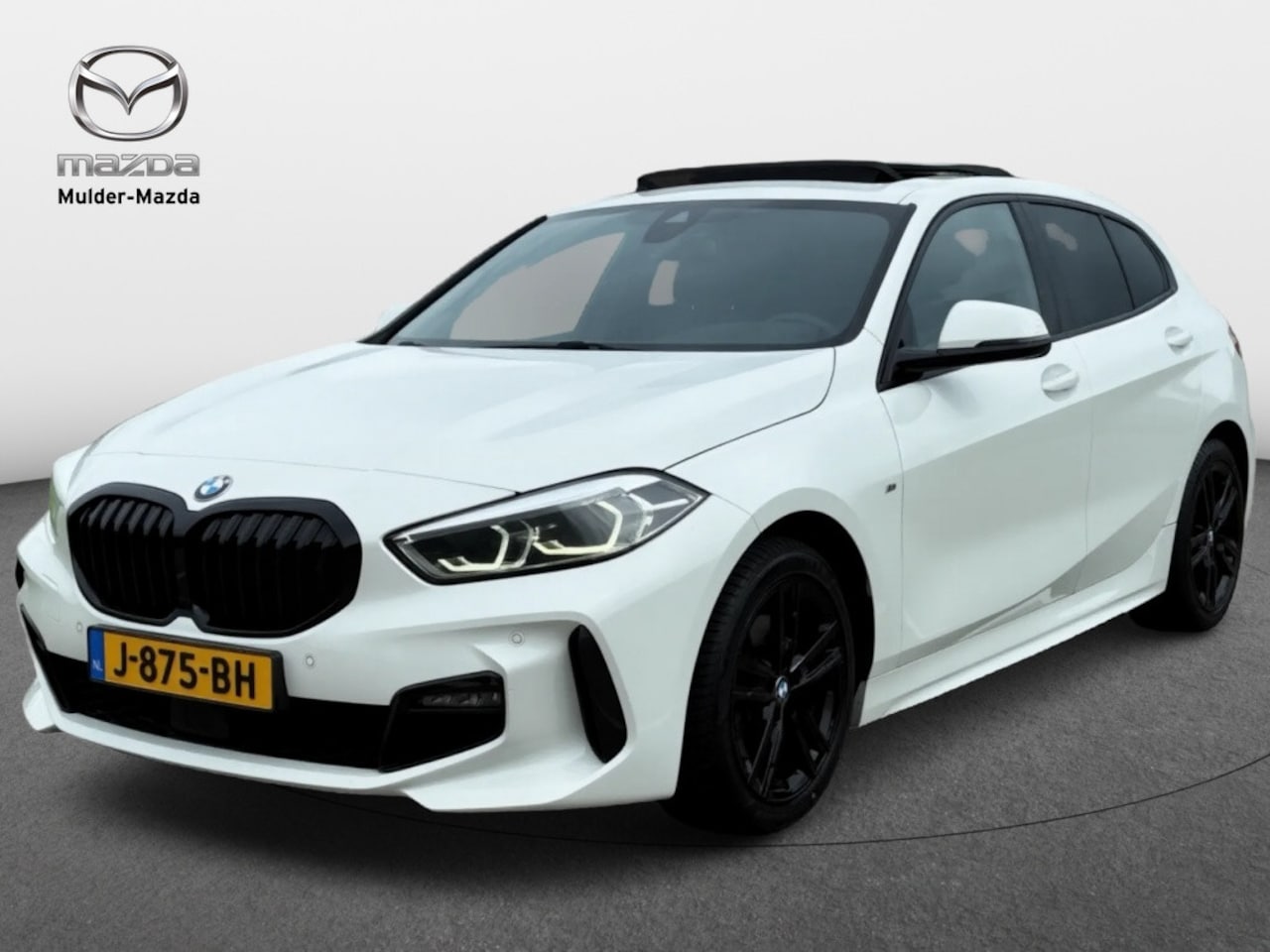 BMW 1-serie - 118i Executive M-Sport | Pano | Head-up | Shadow line-pack | Stoelverwarming - AutoWereld.nl