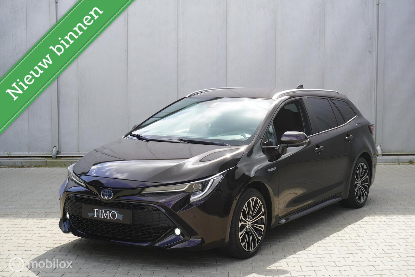 Toyota Corolla Touring Sports - 1.8 Hybrid 55.136 KM - AutoWereld.nl