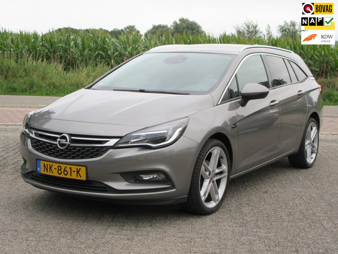 Opel Astra Sports Tourer - 1.4 Innovation+ Parkeersensoren + Navigatie - AutoWereld.nl