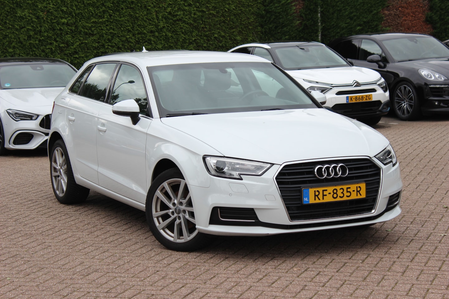 Audi A3 Sportback - 1.0 TFSI Design Pro Line Plus / Trekhaak / Navigatie / Parkeerhulp V+A / 17'' / Half leder - AutoWereld.nl