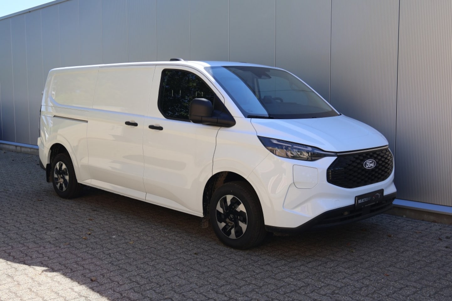 Ford Transit Custom - E-Transit 340 L2H1 Trend 71kWh - AutoWereld.nl