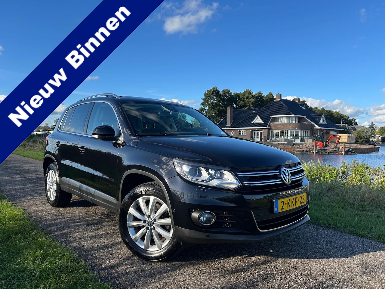 Volkswagen Tiguan - 1.4 TSI Sport&Style | Pano | Trekhaak | Navi | Cruise - AutoWereld.nl