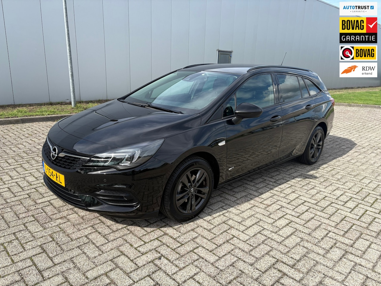 Opel Astra Sports Tourer - 1.2 Design & Tech 1.2 Design & Tech , Climaat control, Parkeersensoren voor en achter en Navigatiesysteem - AutoWereld.nl