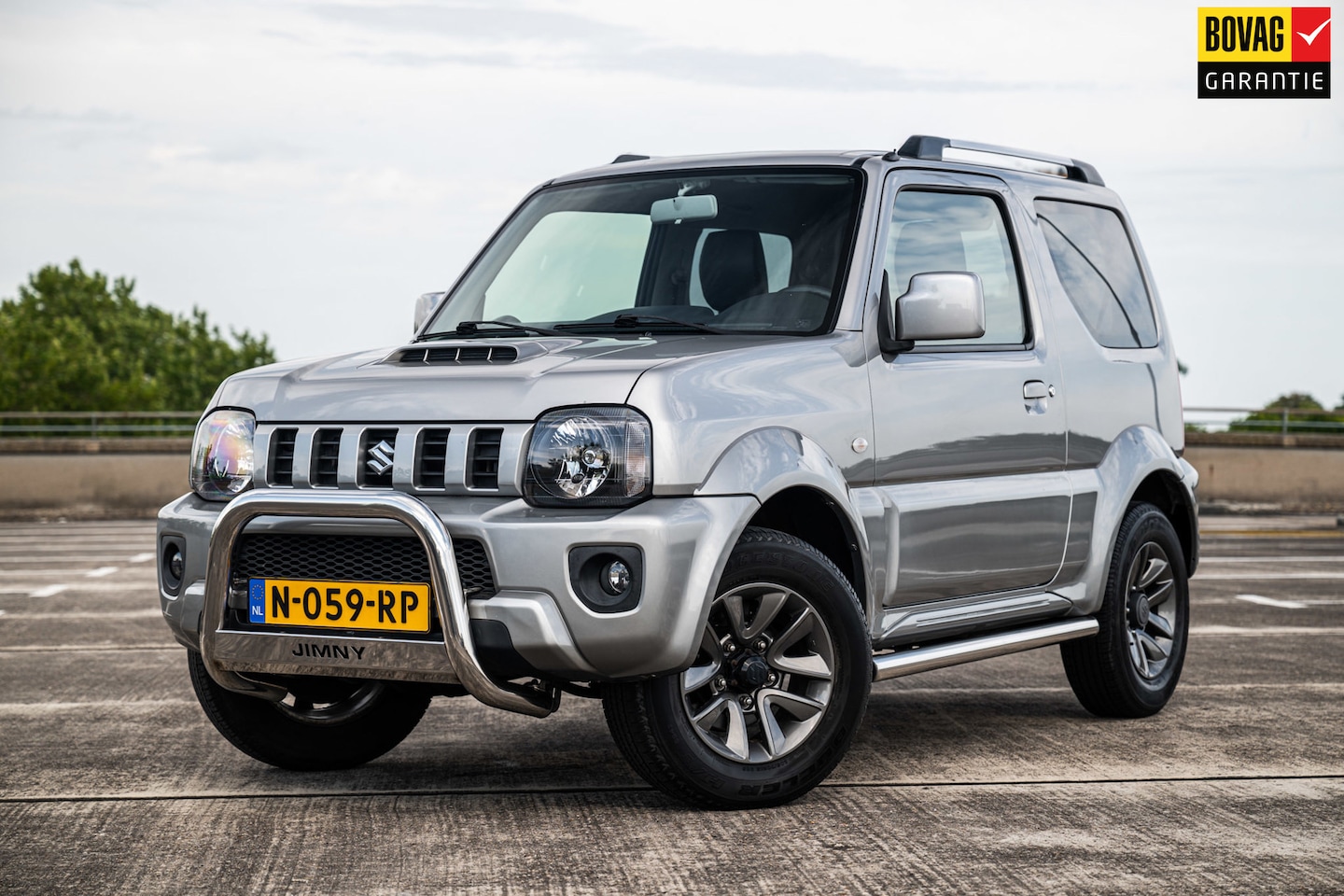 Suzuki Jimny - 1.3 Exclusive | Airco | Stoelverwarming | Centrale Deurvergrendeling | - AutoWereld.nl