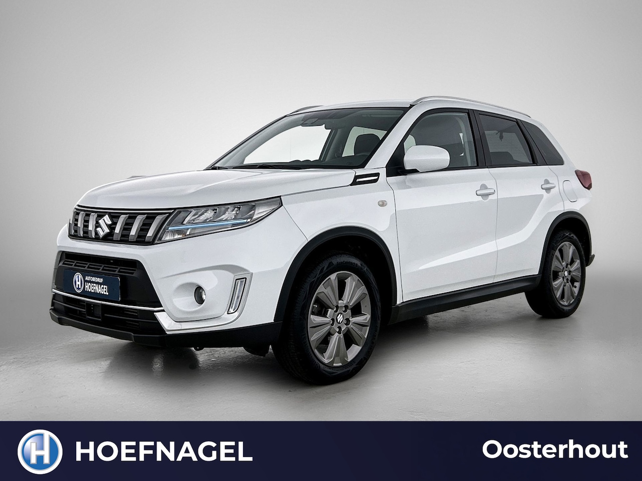 Suzuki Vitara - 1.4 Boosterjet Comfort Smart Hybrid | Adaptive Cruise | Stoelverwarming | CarPlay | Camera - AutoWereld.nl
