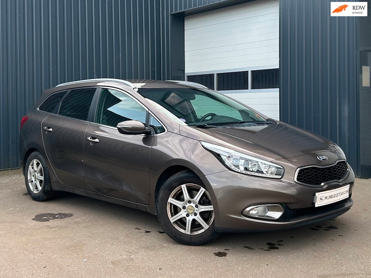 Kia Cee'd Sportswagon - 2014 1.6 GDI BusinessLine - AutoWereld.nl