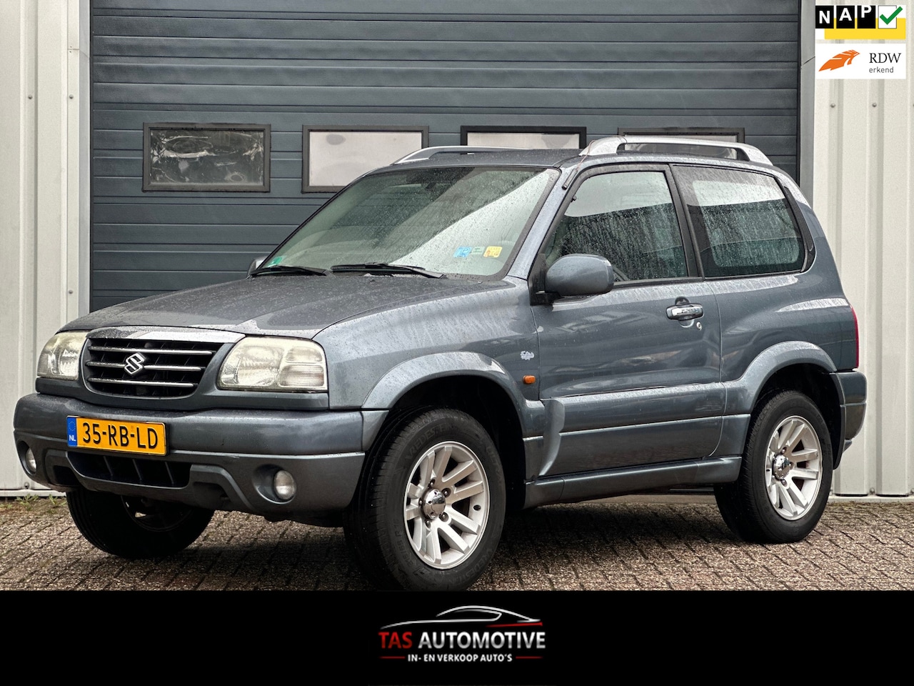 Suzuki Grand Vitara - 1.6 Metal Top FreeStyle-3 4x4 AIRCO/NAP! - AutoWereld.nl
