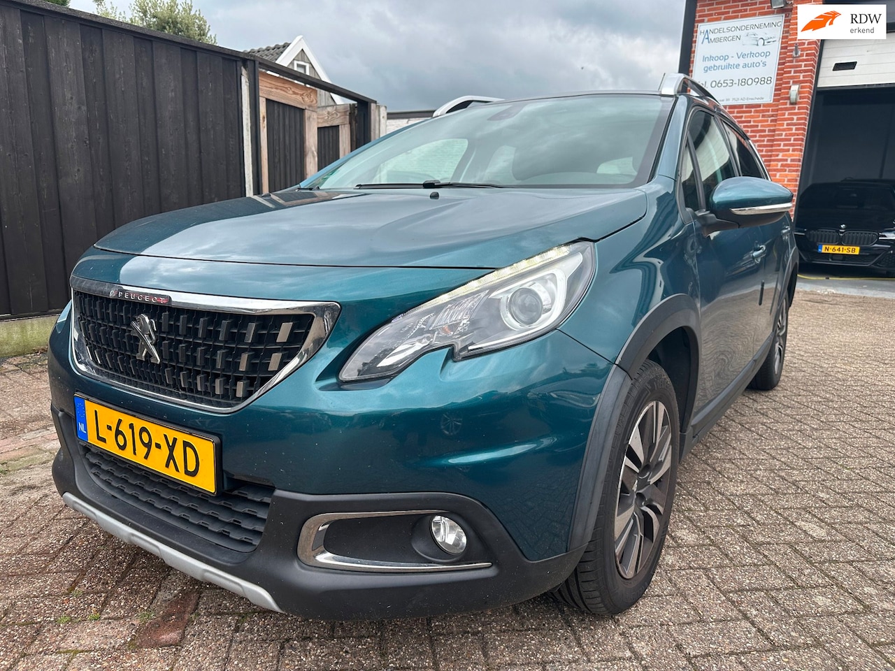 Peugeot 2008 - 1.6 BlueHDi Allure PANORAMADAK-CLIMA-CRUISE-PDC - AutoWereld.nl